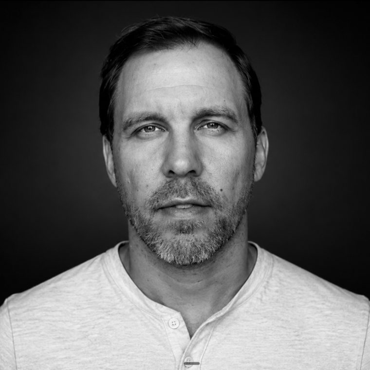 Black and white portrait of Todd Piechowski